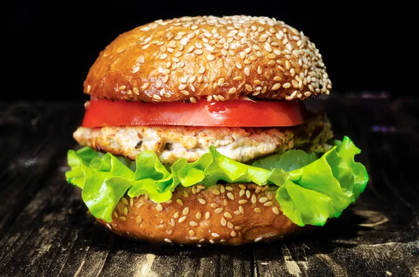 Hamburger with chicken cutlet pineapple, salad and tomato — Stock Photo, Image