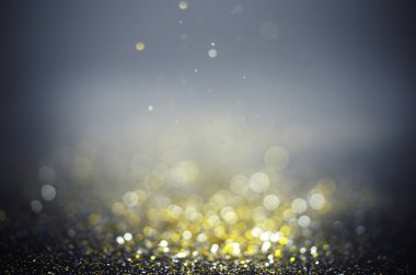 Pırıl pırıl ışıklar arka plan. Altın, gümüş, soyut ışıklar