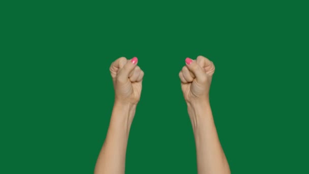 Жінка рука згорнула кулак і піднялася. Жести ручним зеленим екраном, ключ хроми — стокове відео