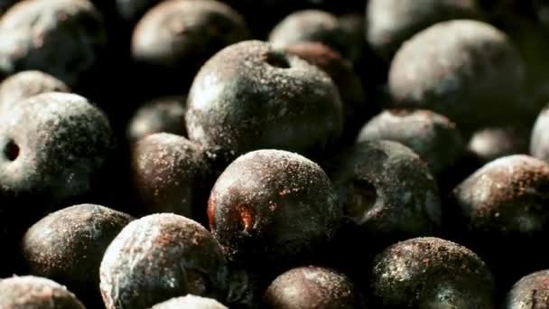 Frozen blueberries with frost rotating, macro shot — 비디오