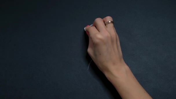 Womans hand drawing heart on chalk board, close up. Love and valentines day concept. — Wideo stockowe