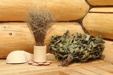 Meşe süpürge, buğulaması, bir ahşap Kepçe için Kuru adaçayı çoğu Rus banyoda.