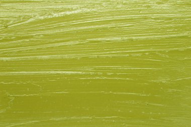 Bu sarı metalik ruj örneği arkaplanının fotoğrafı.