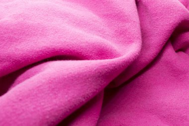 Bu desenli Fuschia Pembe Kumaş Arkaplanının bir fotoğrafı