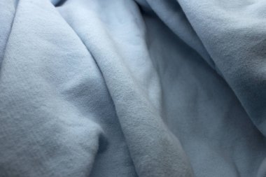 Bu Açık Mavi desenli kumaş arkaplanının bir fotoğrafı.