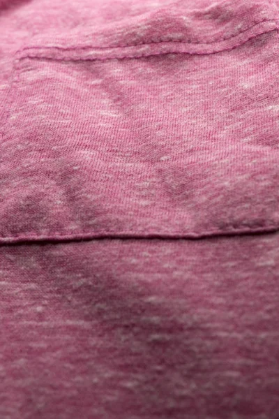 This is a photograph of textured light Pink fabric
