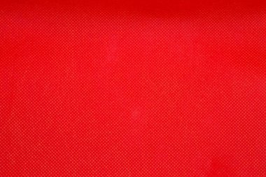 Bu, canlı kırmızı desenli bir arka fonun fotoğrafı.