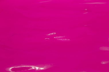 Bu Pembe Akrilik boyanın dokulu bir fotoğrafı.