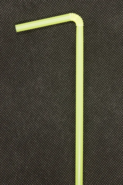 Photograph Neon Yellow Plastic Straw Isolated Textured Black Background — 스톡 사진