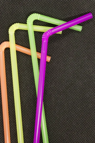 Photograph Colorful Plastic Straws Isolated Textured Black Background — ストック写真