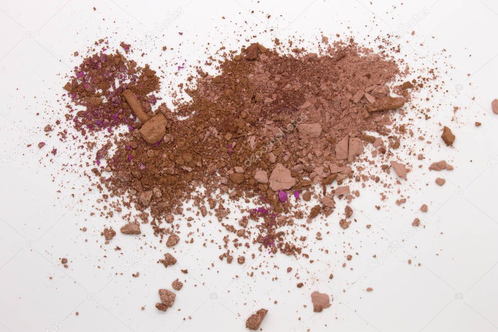 This is a photograph of Brown Powder Eyeshadow on a White background