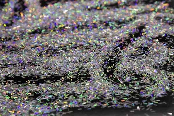 This is a photograph of  a Silver Glitter holographic background