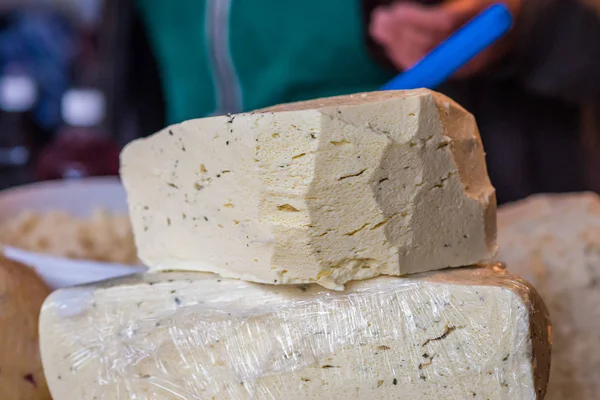 Pieces of cheese with spices — Stock Photo, Image