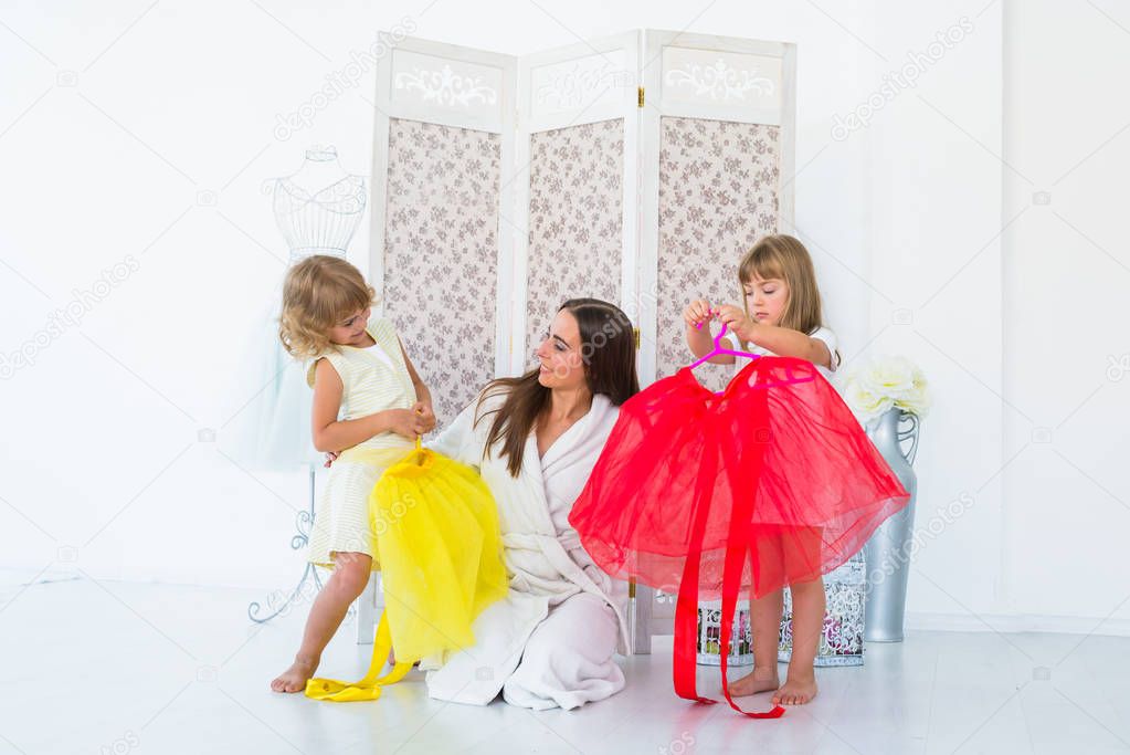 Woman and children in bedroom
