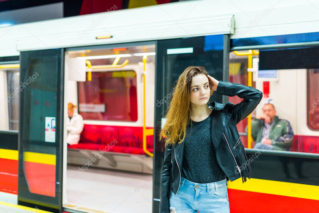 The girl near subway train