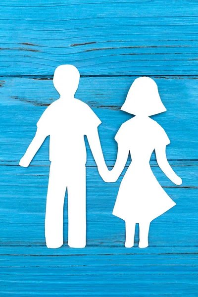 Papiersilhouette von Mann und Frau beim Händchenhalten — Stockfoto