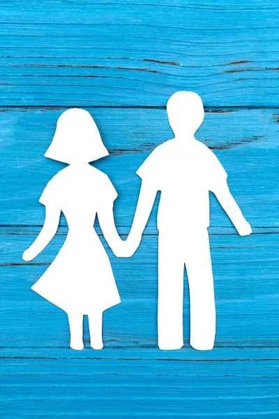 Papiersilhouette von Mann und Frau beim Händchenhalten — Stockfoto