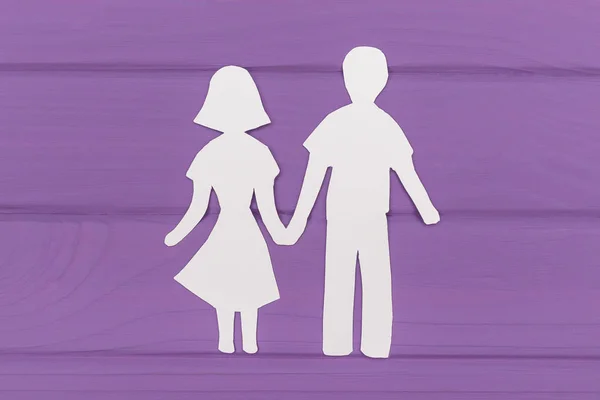 Papier silhouet van man en vrouw hand in hand — Stockfoto