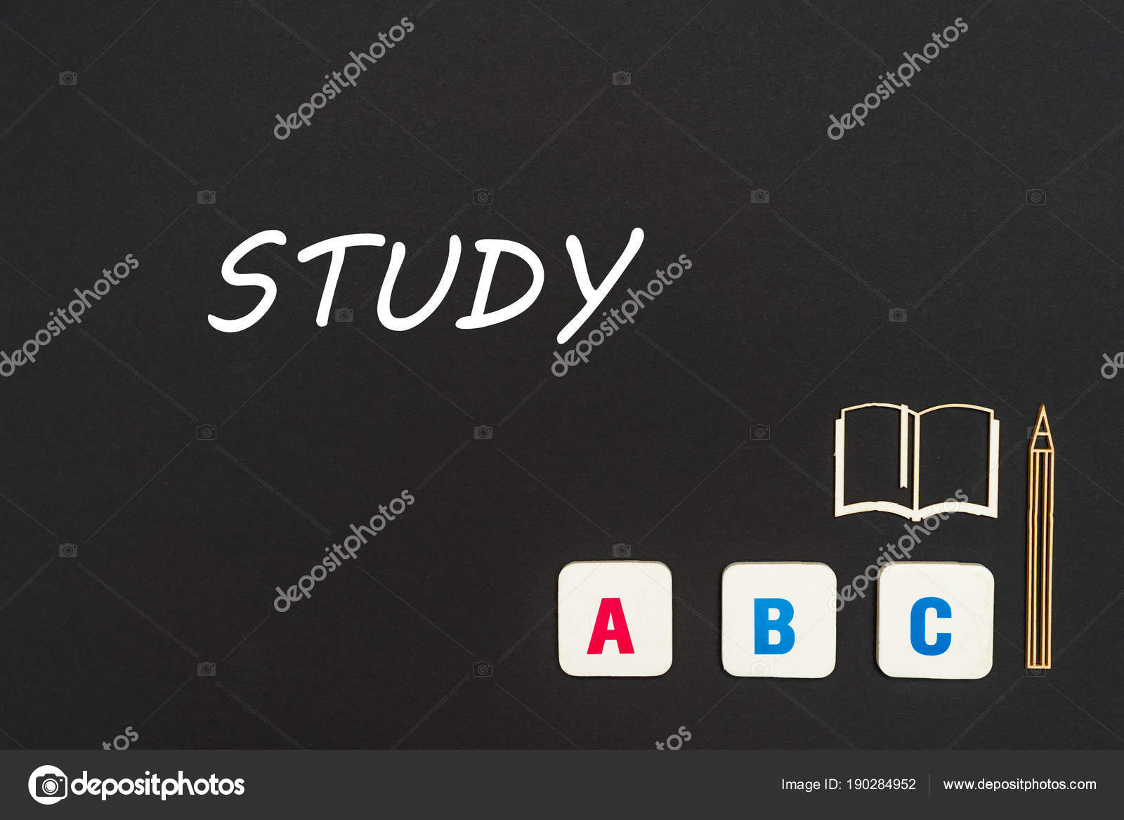 Abc letters and chipboard miniature on blackboard with text study Stock