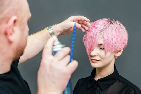 Hairdresser Using Hair Spray Woman Hair Beauty Salon Gray Background — Stock Photo, Image