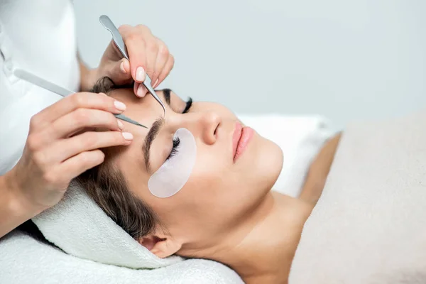 Hands Holds Tweezers Face Young Woman Eyelash Extensions Process Copy — Stock Photo, Image