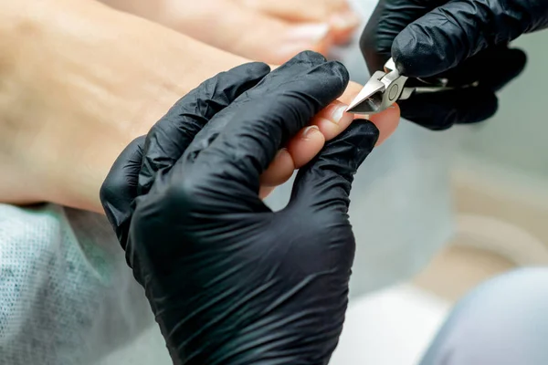 Pedicure Master Cuts Foot Nails Woman Pedicure Procedure — Stock Photo, Image