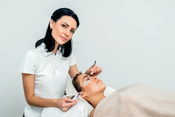 Beautician Patient Eyelash Extension Procedure White Background — Stock Photo, Image