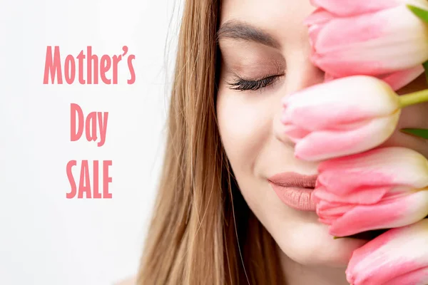 Closed Eyes Young Woman Pink Tulips Her Face White Background — Stock Photo, Image