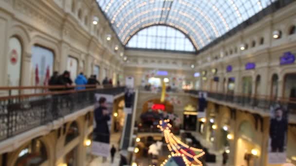 Top view people in shopping Mall, blurred, choosing gifts for Christmas and new year rush — Stock Video
