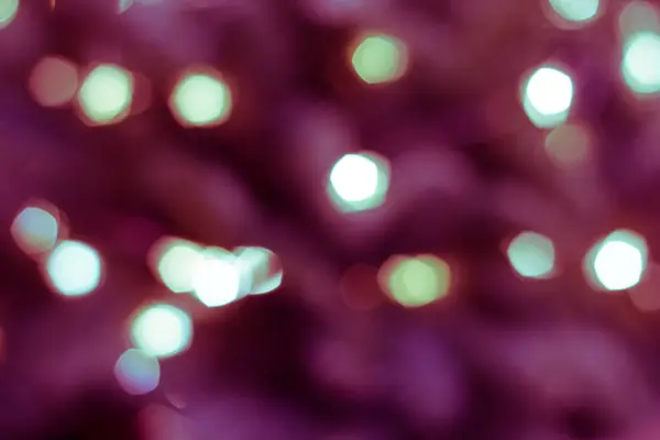 Colorful lights on red background. holiday bokeh. Abstract Christmas — Stock Photo, Image