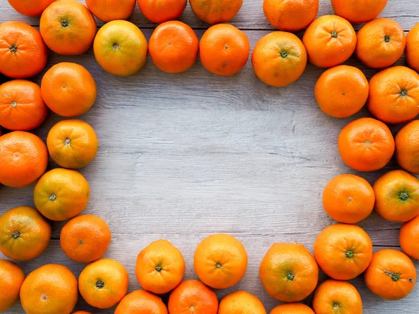 fresh Mandarin oranges as a background, cover, space for text