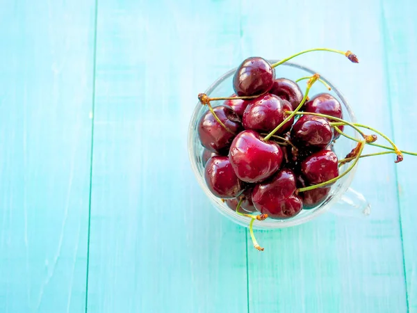 Cherries. Cherry. Cherries in color bowl and kitchen napkin. Red cherry. Fresh cherries. Cherry on white background. healthy food concept