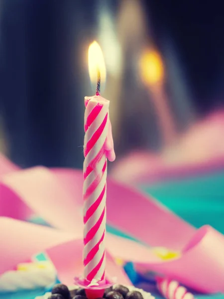 Burning Birthday Candle Cake On A color Background. — Stock Photo, Image