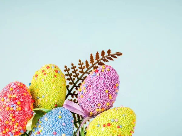 Colorful Easter Eggs on a blue background. — Stock Photo, Image