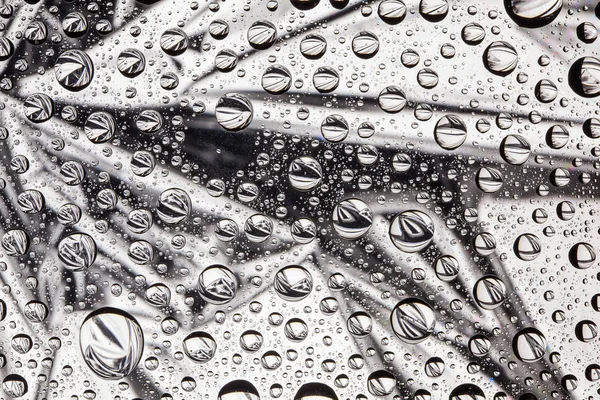 Garis abstrak melalui tetes air pada makro kaca — Stok Foto