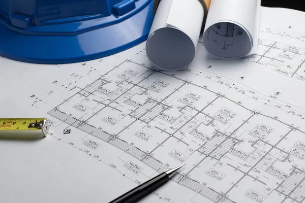 architectural plans project drawing with blueprints rolls