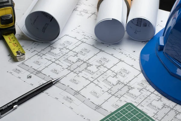 architectural plans project drawing with blueprints rolls