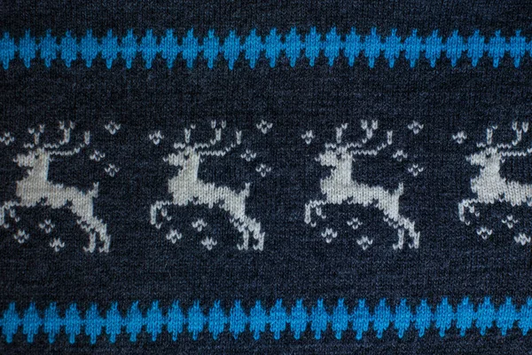 Орнамент оленів на в'язаному вовняному светрі — стокове фото