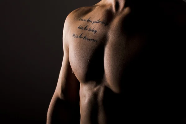Sexy Mascular Man Tattooed Torso on Black Background. Male Chest Close Up. — Stock Photo, Image
