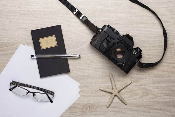 Summer Holiday Planing Background. Accessories on Table, Vacation and Travel Concept.