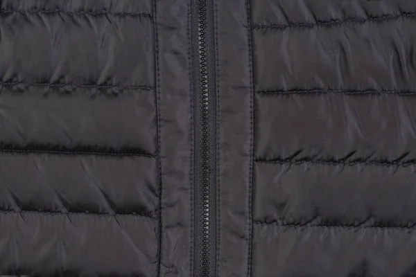 Textura abajo chaqueta negra con cremallera —  Fotos de Stock