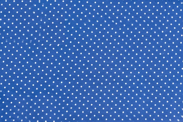 Текстура синьої тканини в горошині — стокове фото