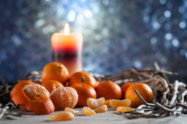Composition of tangerines and candles — Stock Photo, Image