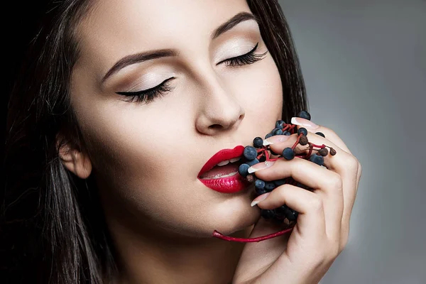 brunette woman with red lips