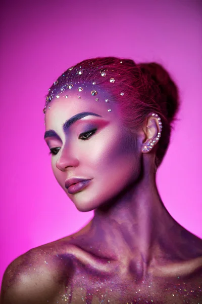 Girl with fancy makeup Stock Photo by ©alla.falkovskaya.mail.ru 147559329