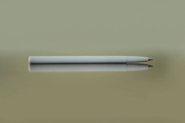 Yansıtıcı yüzeyde kopya alanı ile yalan top kalem.