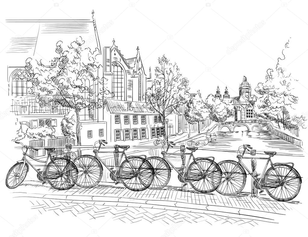 Bicycles on bridge over the canals of Amsterdam, Netherlands