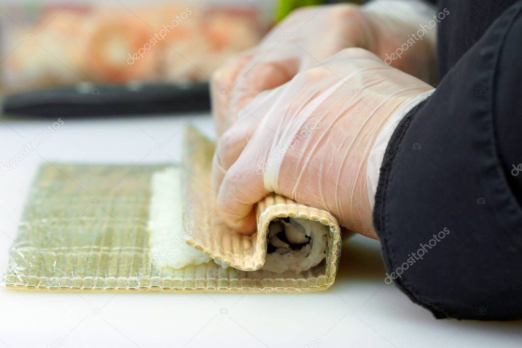Japanese food. Roll's cooking process. Close up view