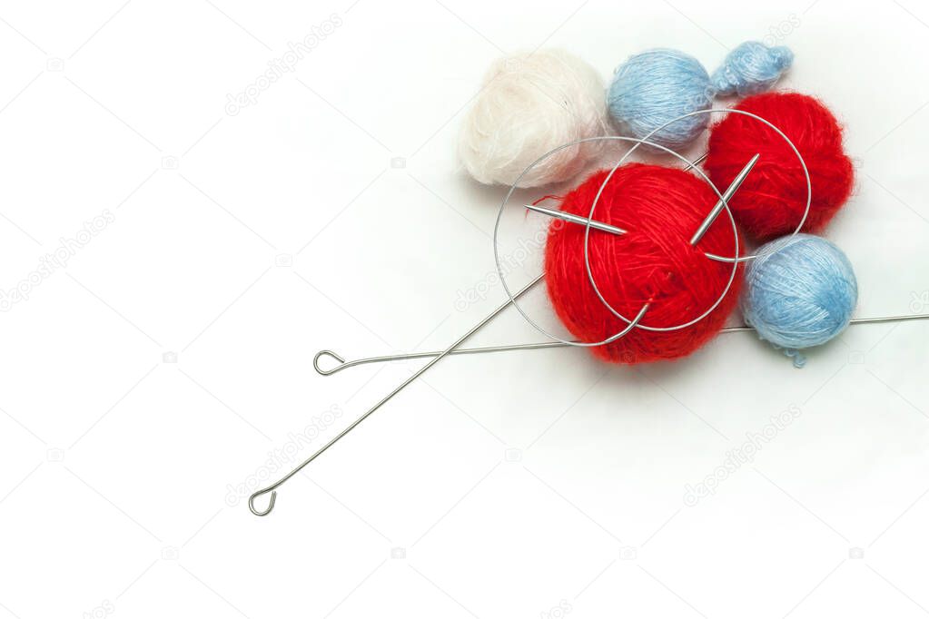 Colorful wool balls for hand craft wears on white background.