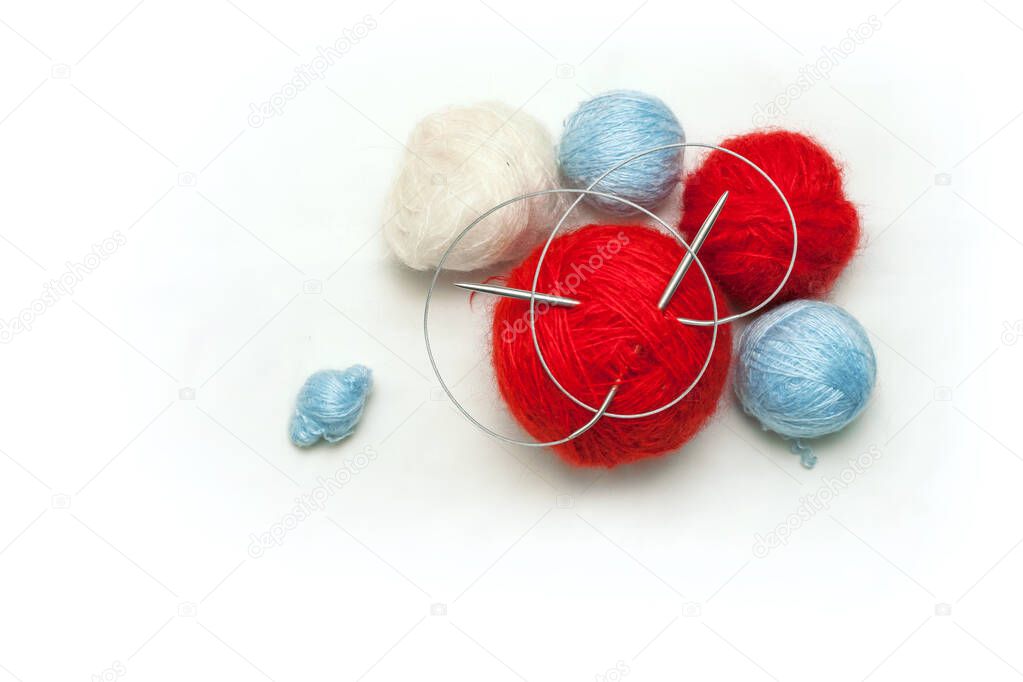 Colorful wool balls for hand craft wears on white background.